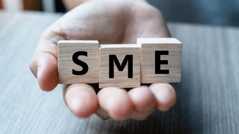 SME, spelled on wooden blocks.